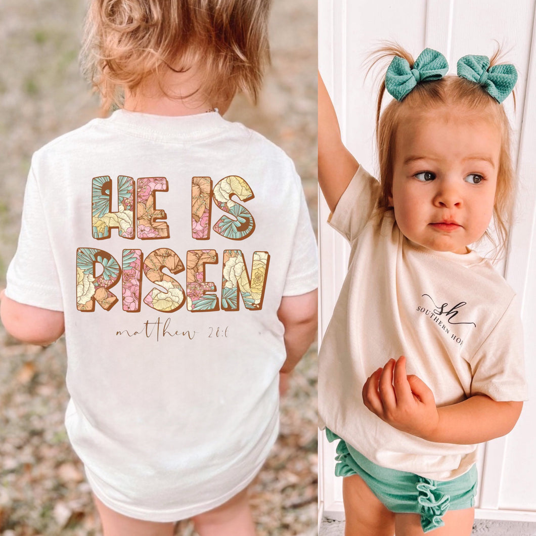 (Natural) Matthew 28:6 Floral He Is Risen Short Sleeve Girls Tee